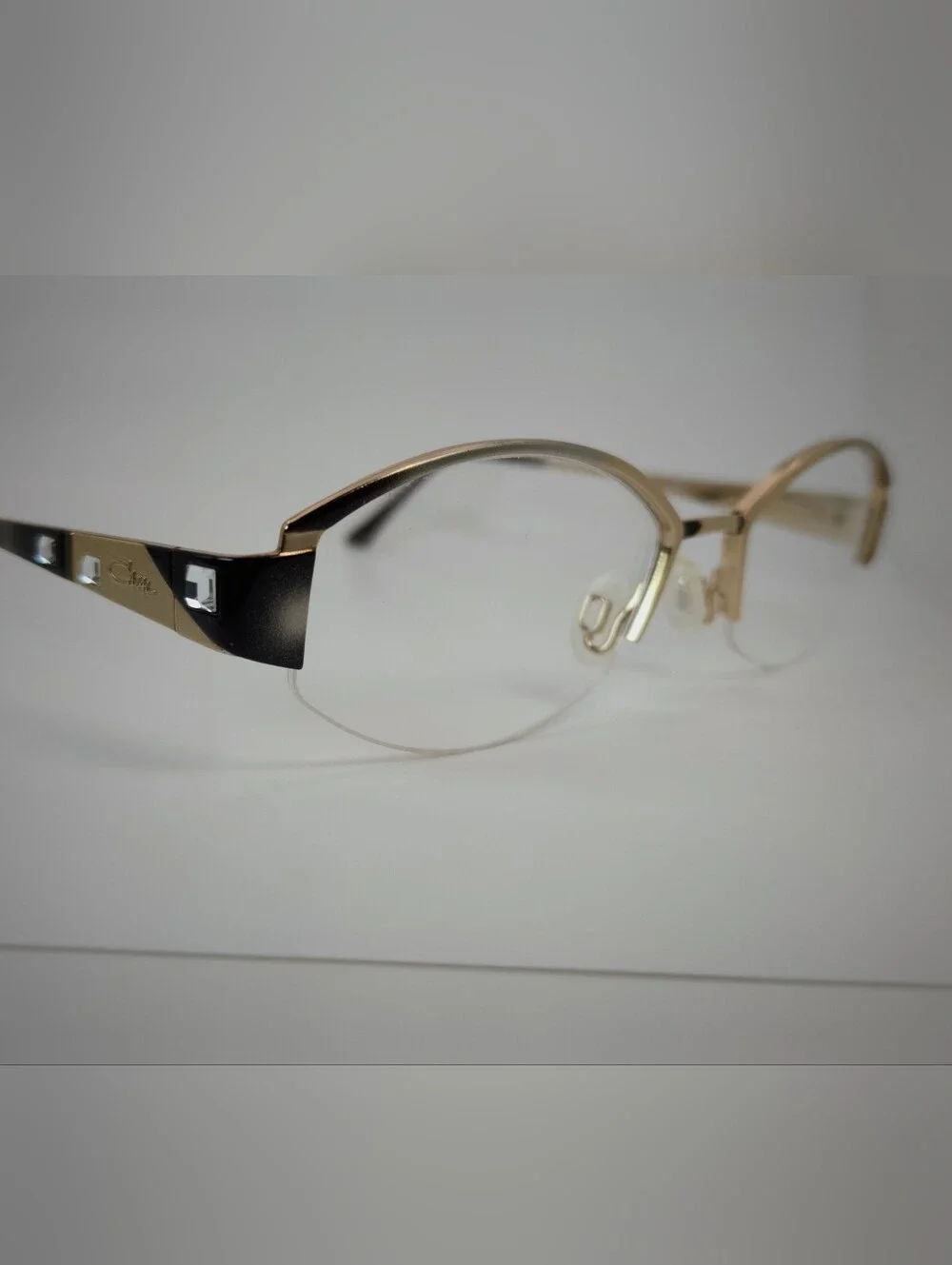 Cazal. Gold and Black Semi-Rimless Women’s Eyeglasses. Germany